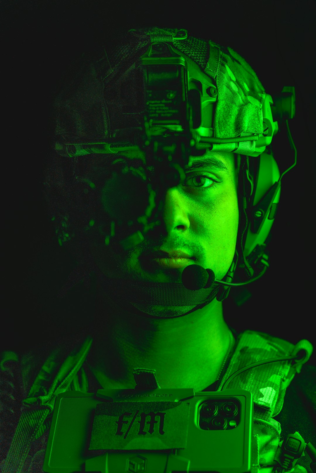 a-man-in-a-military-uniform-holding-a-camera-gehv3j5w-6i